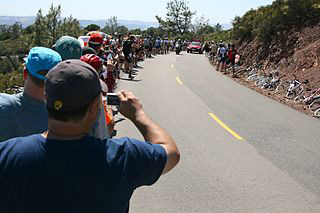 Cycling fans taking pictures